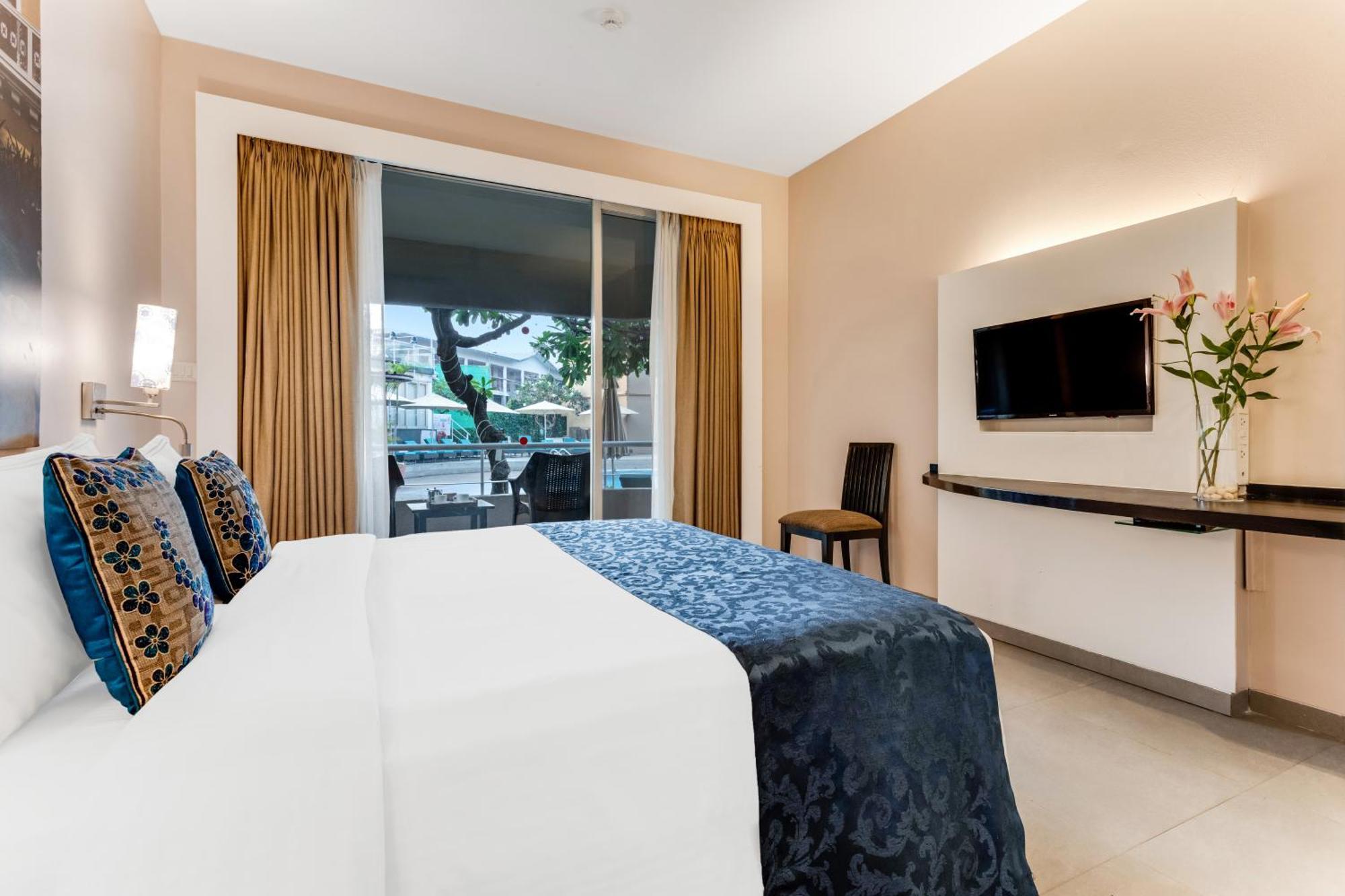 Whispering Palms Beach Resort Candolim Esterno foto